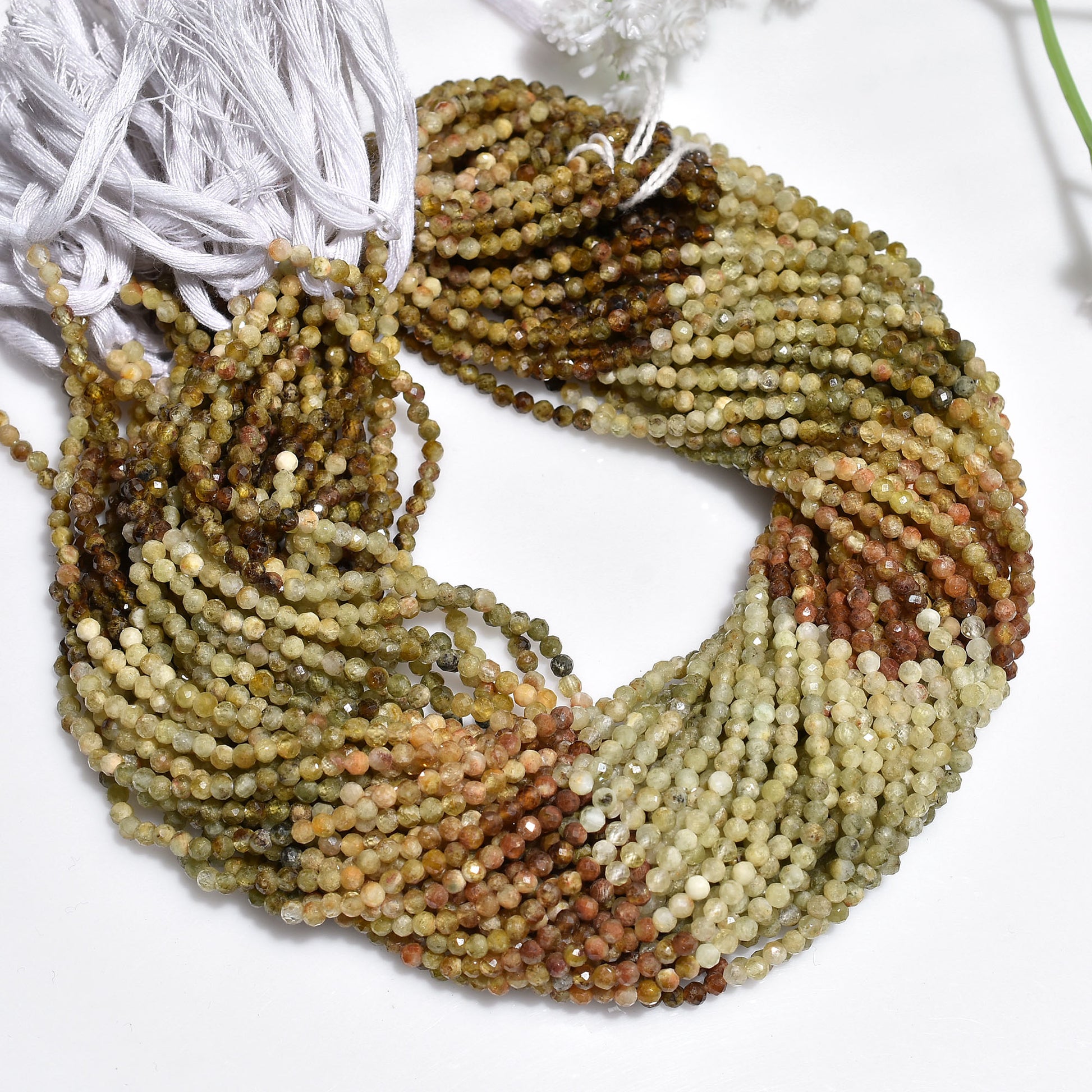grossular garnet, green garnet, garnet beads, faceted beads, micro cut, rondelle beads, gemstone strand, 2mm beads, loose beads, jewelry making, gemstone jewelry, beaded necklace, bracelet beads, natural gemstone, diy jewelry, beading supplies, faceted gemstone, polished beads, green stone, crystal beads
