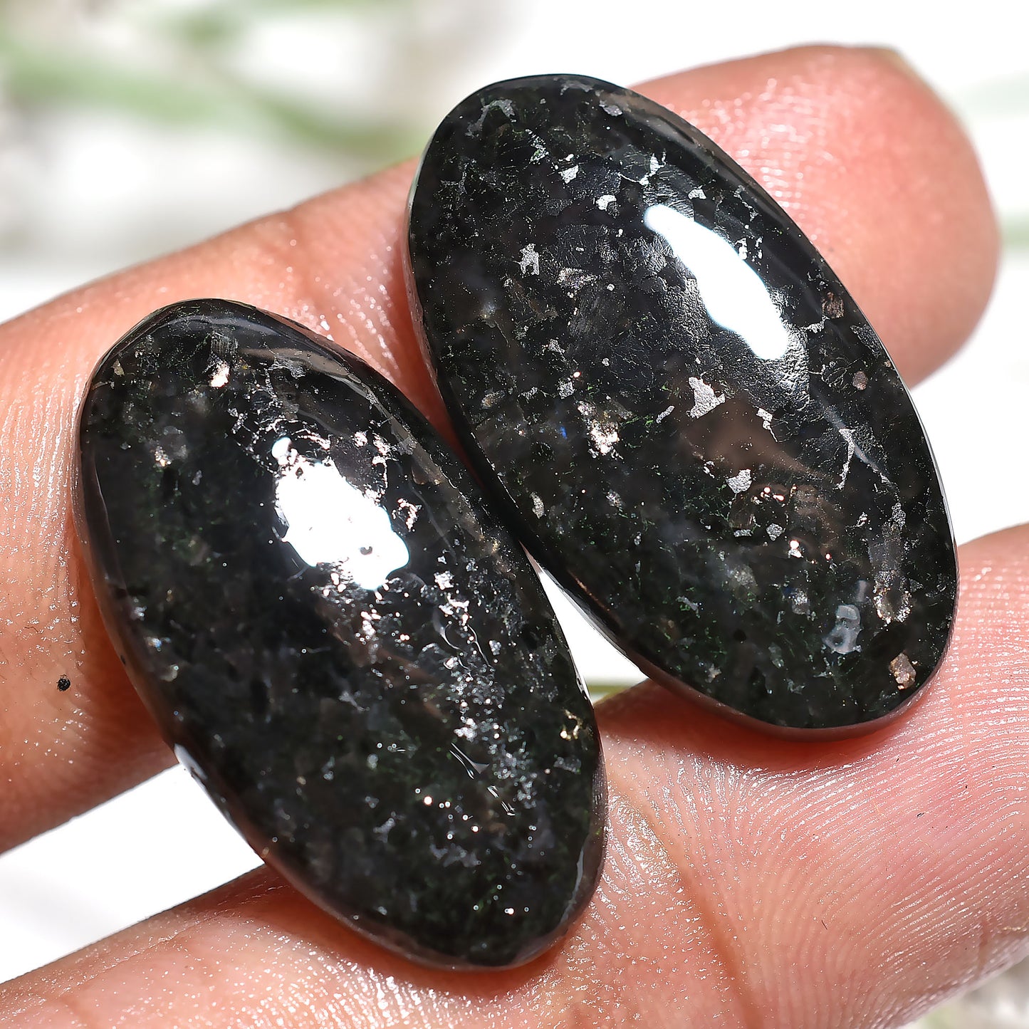 Beautiful Nuummite Oval Gemstone Pair – Black Cabochons with Golden Spark