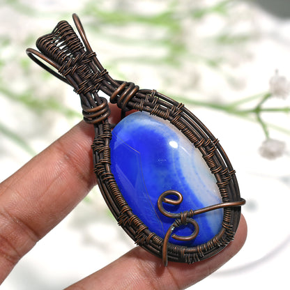 Scenic Blue Botswana Agate Gemstone Pendant – Oxidized Copper Wire Wrapped Artistic Wholesale Jewelry